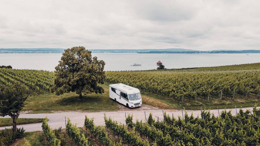 Carado I338 parked in a field near to a lake